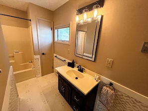 Shower, towels, soap, toilet paper
