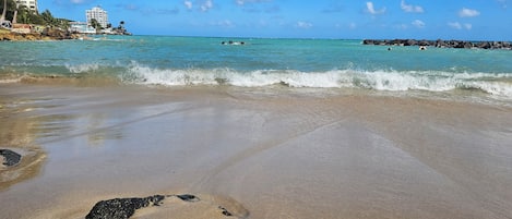 On the beach, sun loungers, beach towels
