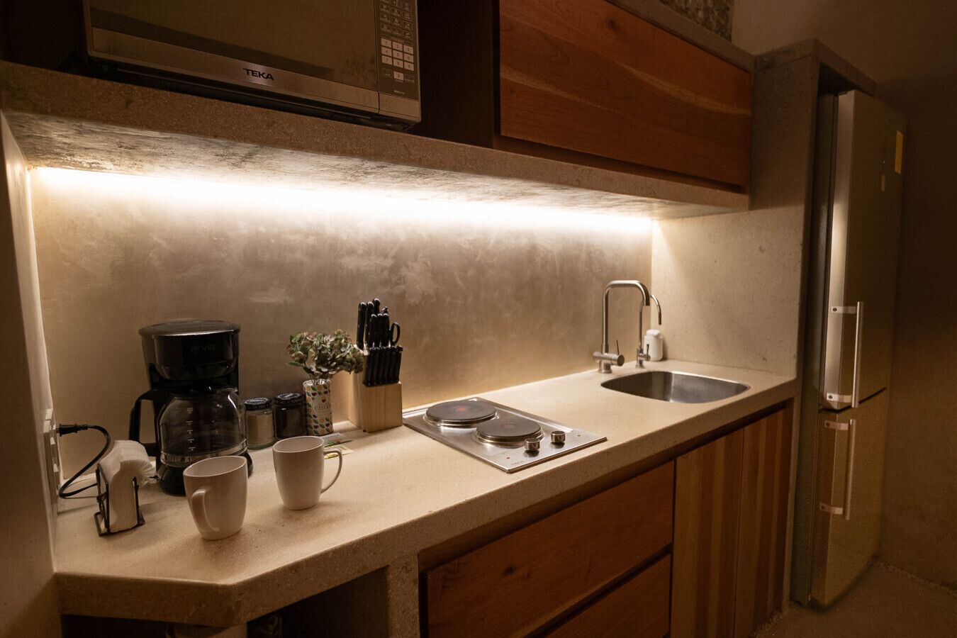 Fridge, microwave, stovetop, coffee/tea maker