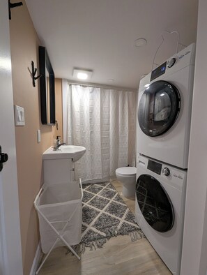 Hair dryer, towels, soap, shampoo - Cozy & Spacious Family Friendly Basement Unit with Private Room and Bathroom (Westphal)