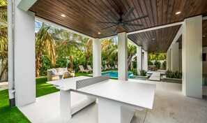 Outdoor dining - Moondance - Steps to the beach! Heated pool! (Anna Maria)