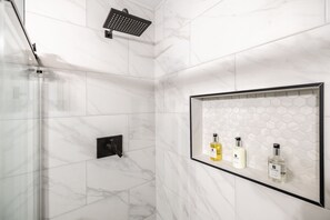 Shower, hair dryer, towels, soap