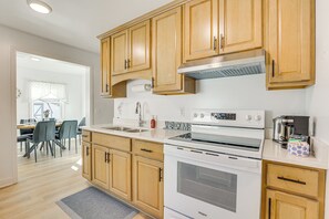 Fridge, microwave, stovetop, coffee/tea maker