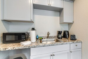 Fridge, microwave, coffee/tea maker, toaster