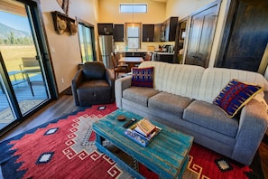 TV, fireplace, books