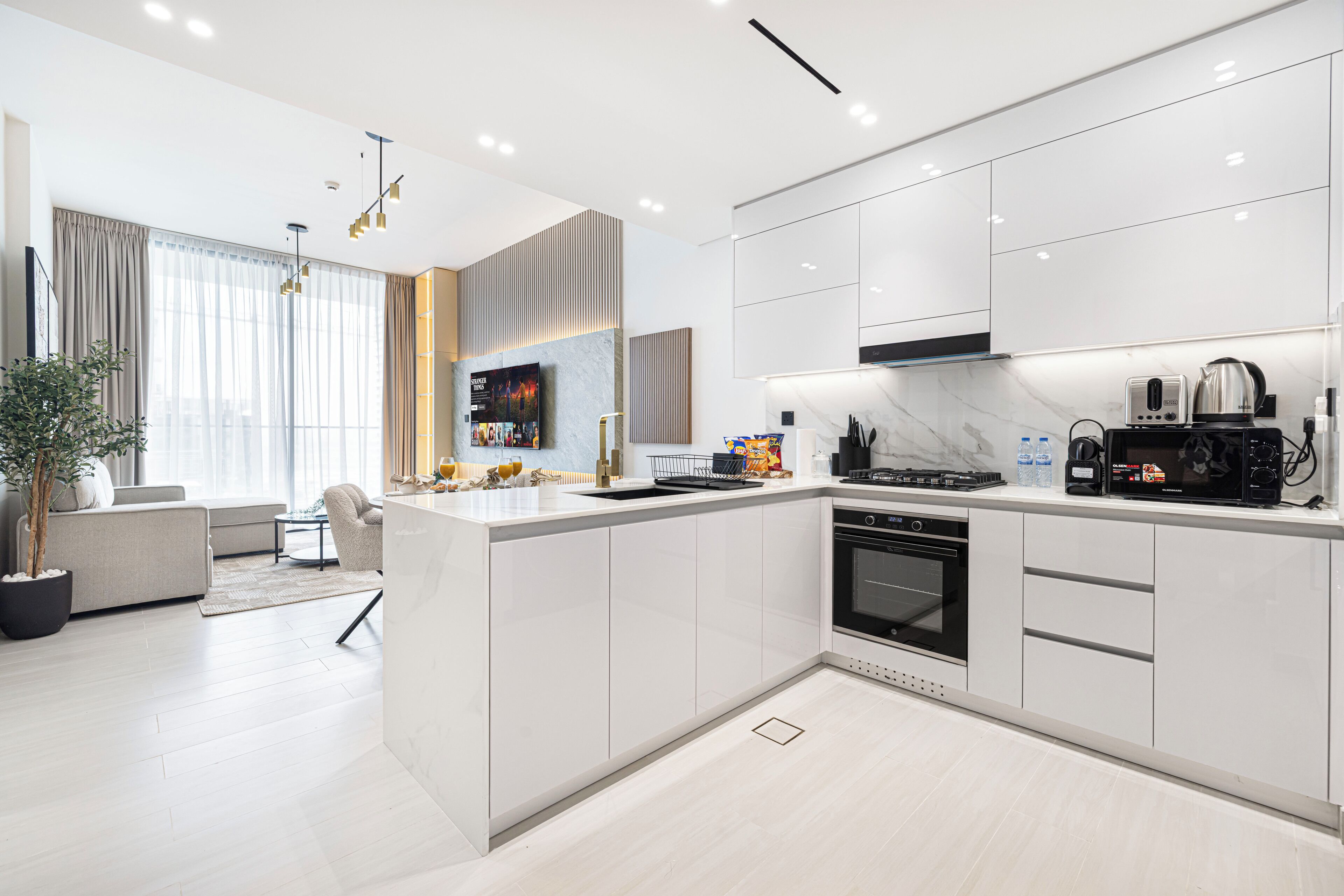 Departamento Deluxe, balcón, vista a la ciudad | Cocina privada | Tetera eléctrica, tostadora, batidora y artículos de limpieza 