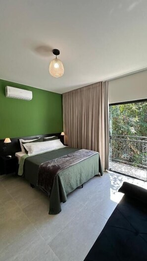 Deluxe Suite, Balcony, Courtyard View | Iron/ironing board, free WiFi - Pousada Flor de Piri (Pirenópolis)