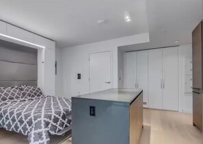 1 غرفة نوم ومكواة/لوح كي وواي فاي وملاءات أسرّة