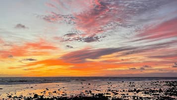 On the beach, sun-loungers, beach towels