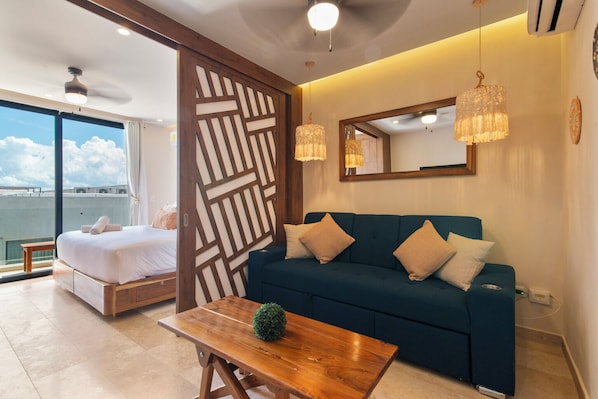 Comfort Studio, 1 King Bed with Sofa bed, Private Bathroom | Living area | 43-inch Smart TV with digital channels