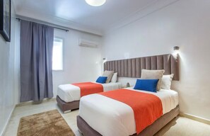3 chambres, coffres-forts dans les chambres, fer et planche Ă repasser