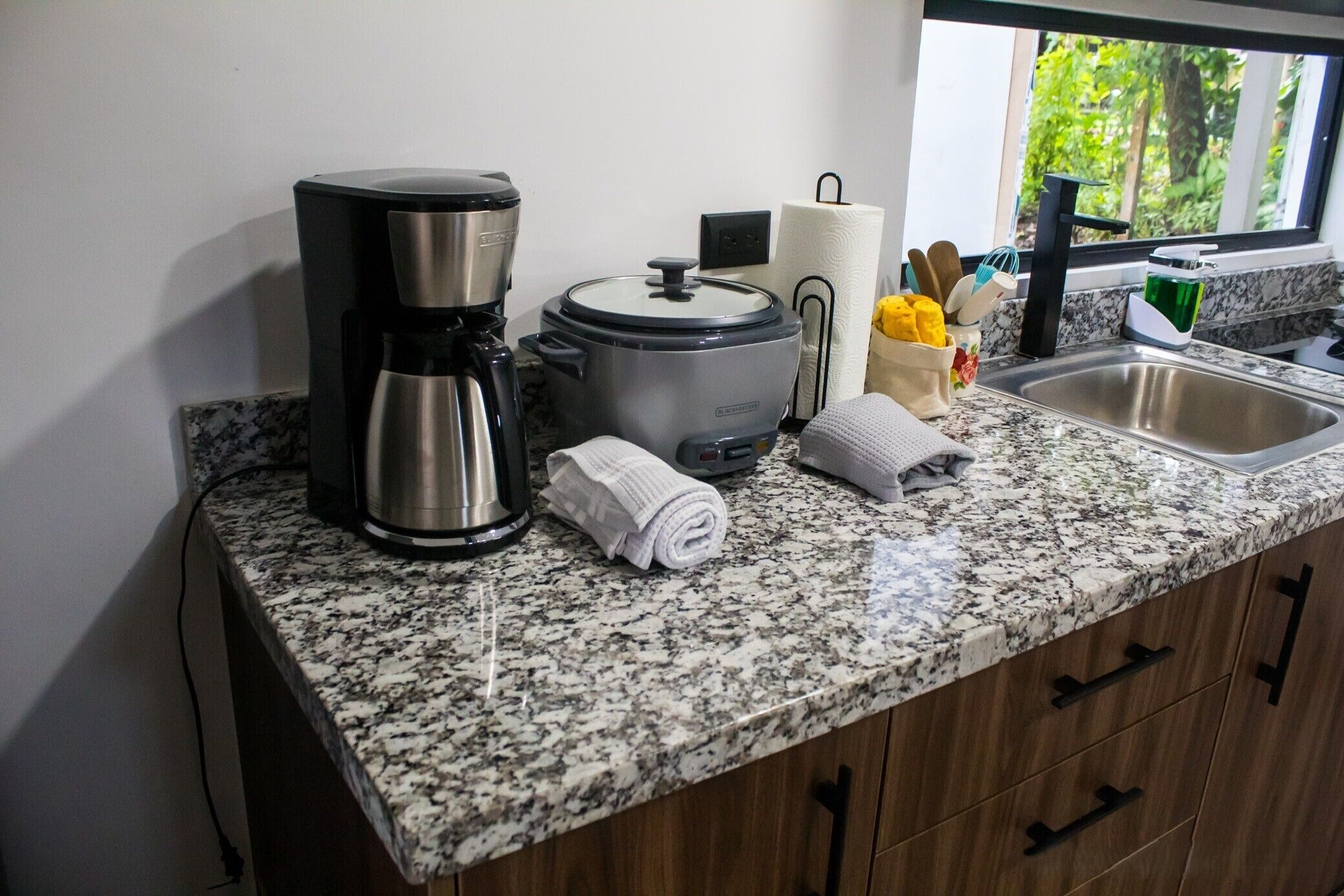 Fridge, microwave, stovetop, coffee/tea maker