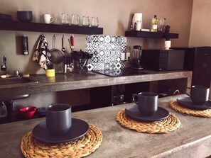 Fridge, microwave, stovetop, coffee/tea maker