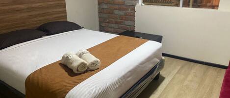 1 habitación, acceso a internet y ropa de cama