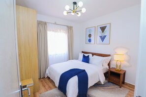 2 chambres, fer et planche à repasser, Wi-Fi, draps fournis