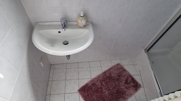 Hair dryer, towels, toilet paper