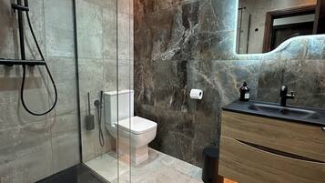 Eco-friendly toiletries, hair dryer, towels, soap