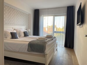 1 habitación, tabla de planchar con plancha, wifi y ropa de cama