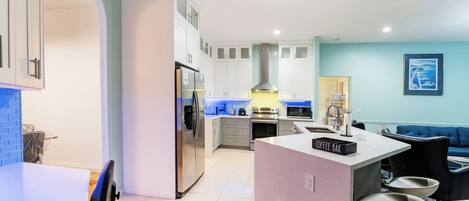 Fridge, microwave, coffee/tea maker, toaster