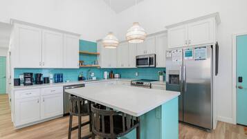 Coffee/tea maker, fridge, microwave, oven