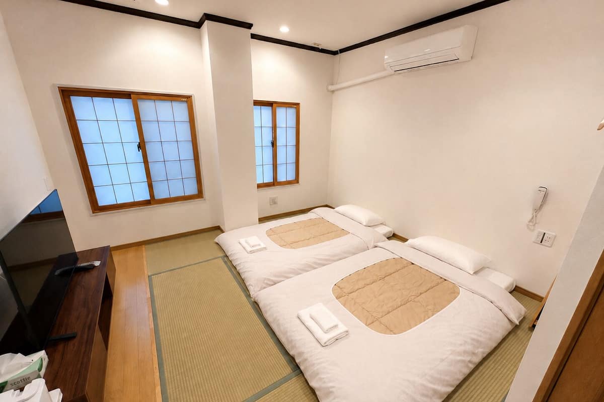 Japanese-style Twin Room, Non Smoking | Bathroom | Separate tub and shower, hair dryer, slippers, bidet