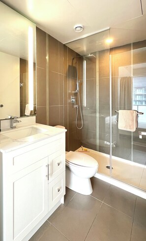 Shower, hair dryer, towels, soap