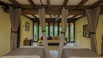 Family Suite, 2 Bedrooms, Patio, Pool View | In-room safe, blackout curtains