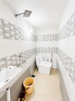 Shower, rainfall showerhead, slippers, towels