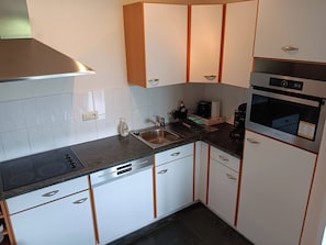 Microwave, stovetop, dishwasher, coffee/tea maker