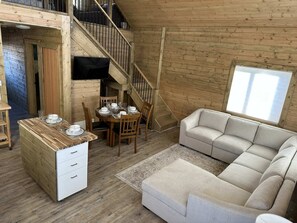 Living area - Kabin Life with Keesca Kabin. Relax after a day of sightseeing in the Rockies. (HINTON)