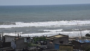 A coastal view with buildings in the foreground and the ocean in the background. -  Safal Exotica Very Close to Sea Beach (Puri)