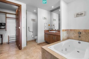 Shower, hair dryer, towels, shampoo