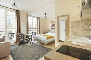 Desk, iron/ironing board, travel cot, bed sheets