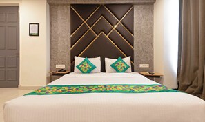 Habitación Deluxe doble | Tabla de planchar con plancha