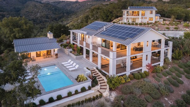 A modern two-story house with a swimming pool, solar panels, and a scenic hillside view. - Vineyard Views w/ Pool & Game Room Near Trails | Beginnings Ranch & Vineyard (Paso Robles)