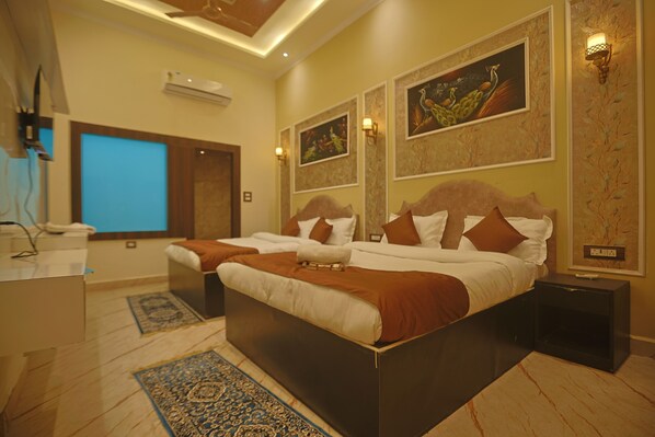 Family Quadruple Room | Desk, laptop workspace, soundproofing, iron/ironing board - Hotel Om Vilas (Mathura)