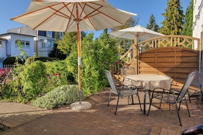 Outdoor dining - Stranddistel Haus Gudrun family suite 2 with 77 m², WLAN and 2 bathrooms (Zinnowitz)
