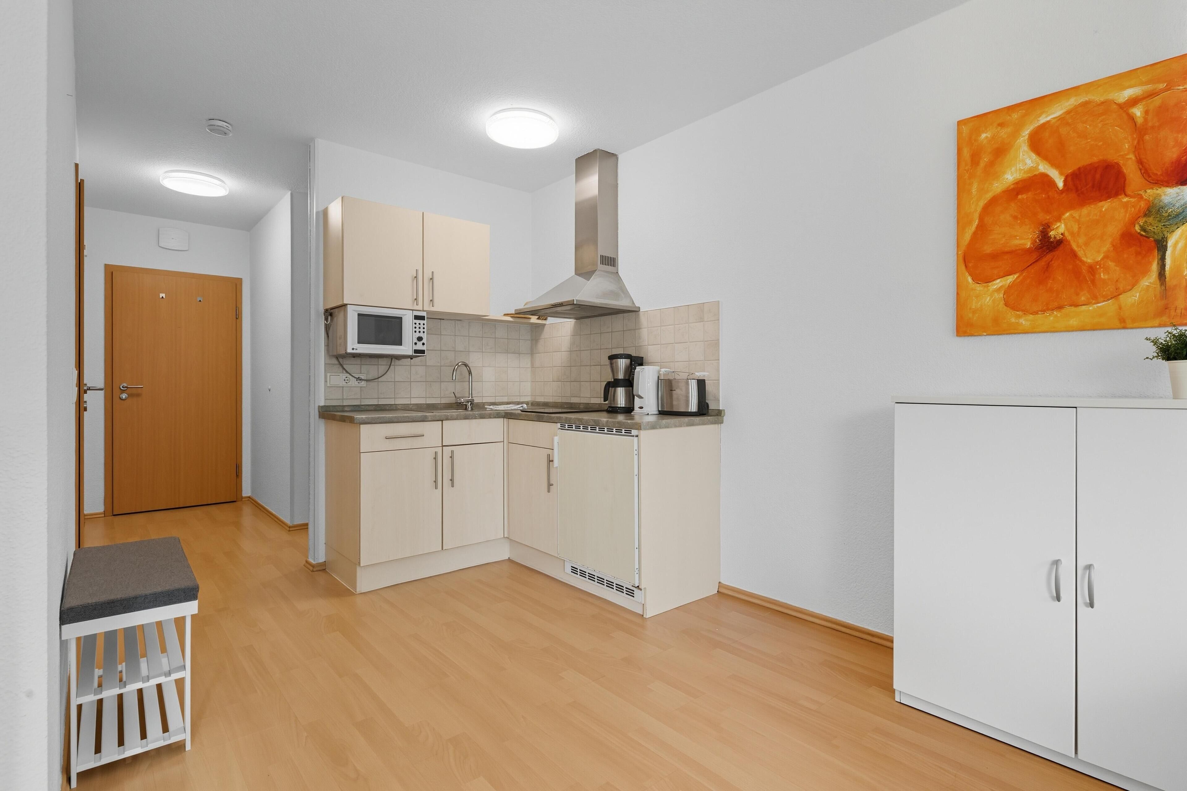 Fridge, microwave, coffee/tea maker, toaster