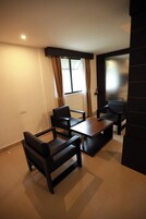 Superior Double Room | Living area | 36-inch LED TV with cable channels