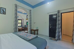 Suite Deluxe, vistas al jardín | Wifi gratis y ropa de cama