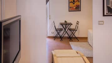 Classic Apartment, Balcony, City View | Laptop workspace, blackout drapes, iron/ironing board