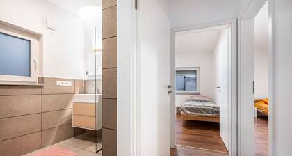 Ferienhaus 'Cozy Ground Floor' mit privater Terrasse, privatem Garten und WLAN