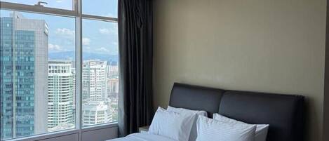 Double Room, 3 Bedrooms, City View | In-room safe, laptop workspace, blackout drapes, iron/ironing board