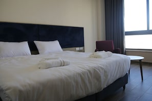 Deluxe Single Room, City View | Desk, laptop workspace, free WiFi