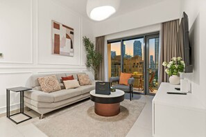 TV - FIRST CLASS | 2BR | Burj Khalifa & Pool Views (Downtown)