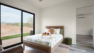 Iron/ironing board, travel crib, free WiFi, bed sheets