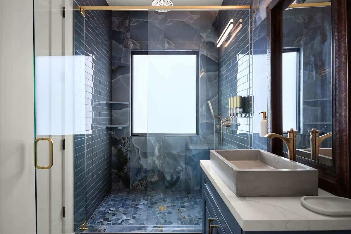 Shower, hair dryer, towels, shampoo