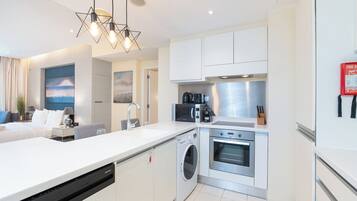 Luxury Studio, Balcony | Private kitchen | Full-size fridge, microwave, oven, stovetop