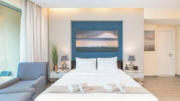 Luxury Studio, Balcony | In-room safe, desk, laptop workspace, blackout drapes