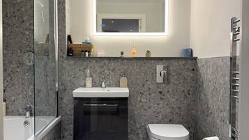 Hair dryer, towels, soap, toilet paper
